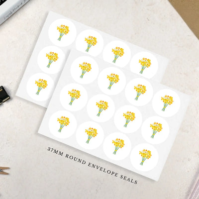 2 sheets of round envelope seal stickers featuring an illustration of a bunch of yellow daffodils with green stalks. The stickers measure 37mm diameter and there are 12 stickers per sheet.