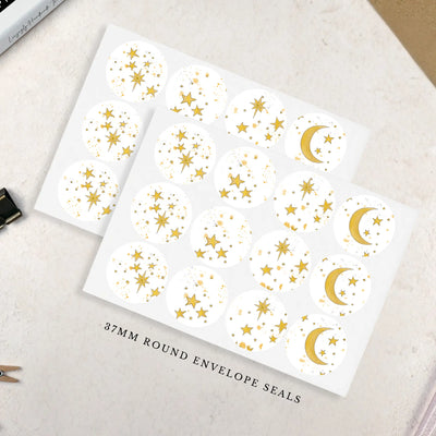 Two sheets of gold star and moon patterned 37mm round envelope seals on a light surface.
