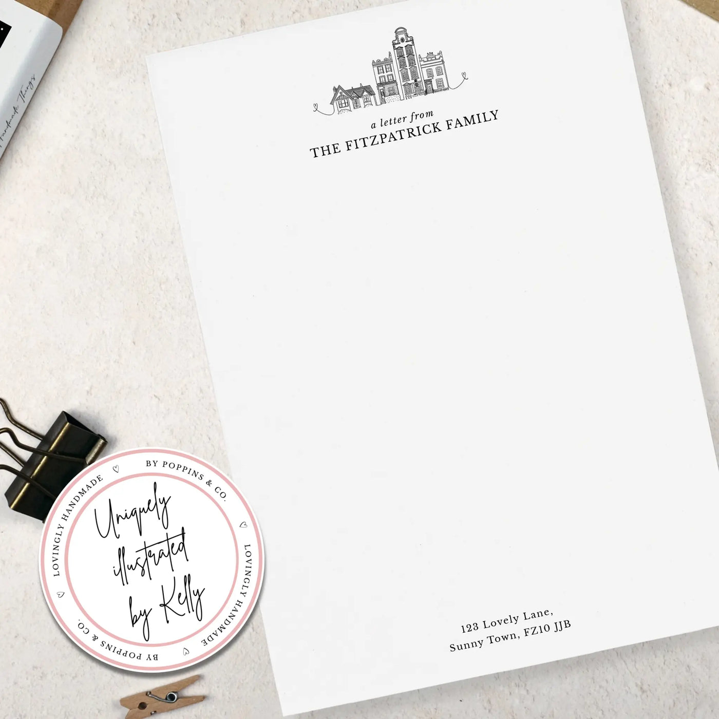 Letterhead with family name and address, accompanied by a round label with text and a logo.