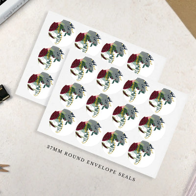 Sheet of 37mm round envelope seals with burgundy and white and floral design on a white background.